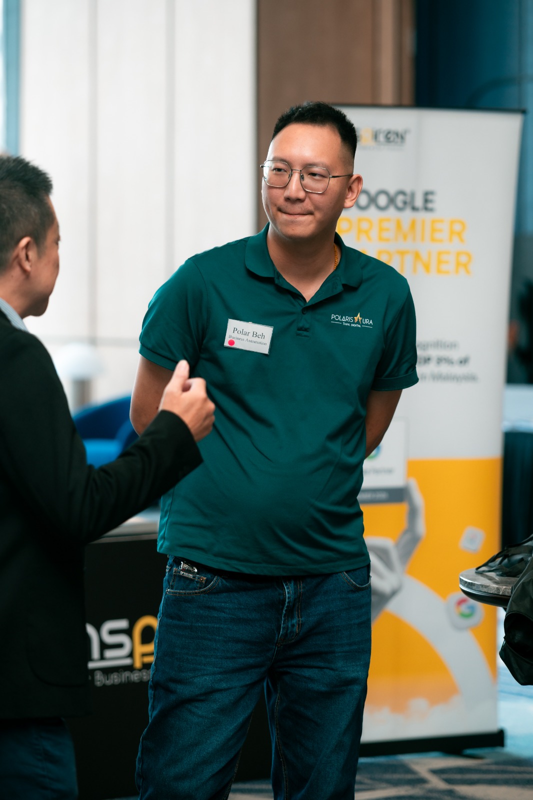 Polar Beh at a partner event beside a Google Premier Partner banner.